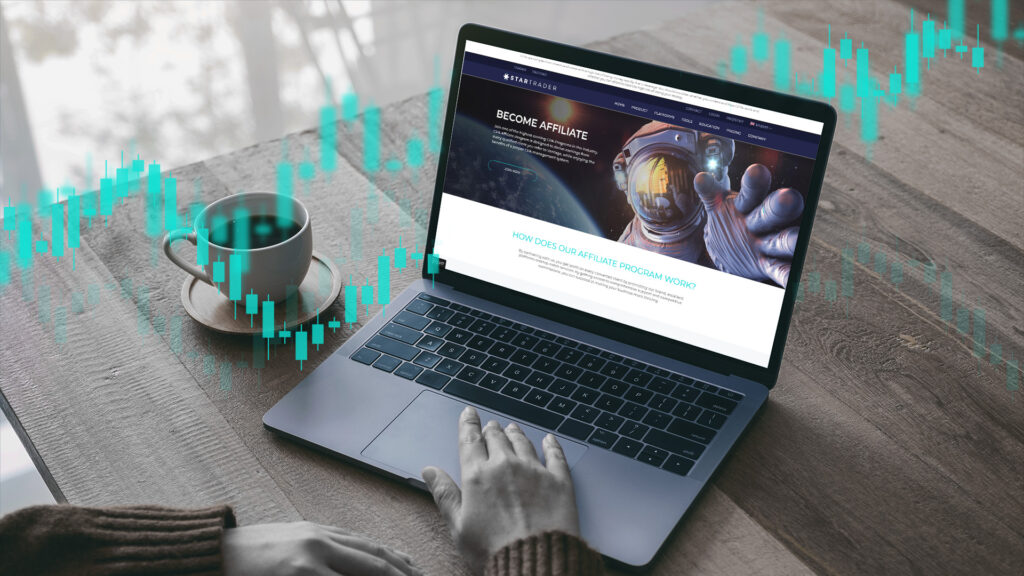 Un ordenador portátil con las instrucciones para afiliarse a STARTRADER